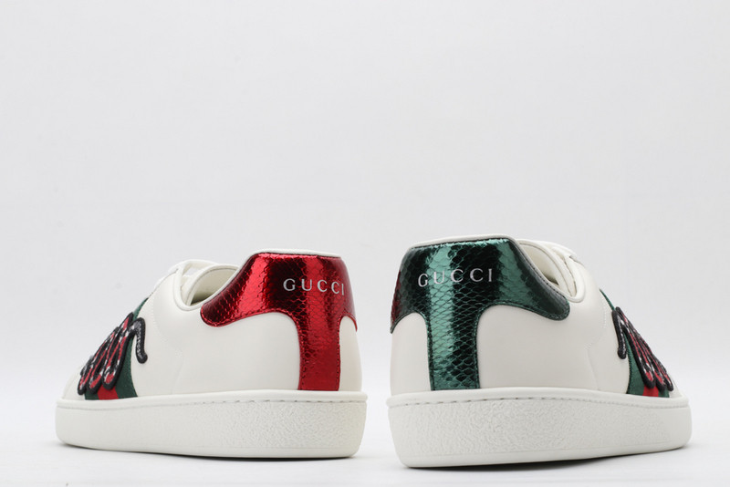 G*u*i sneakers