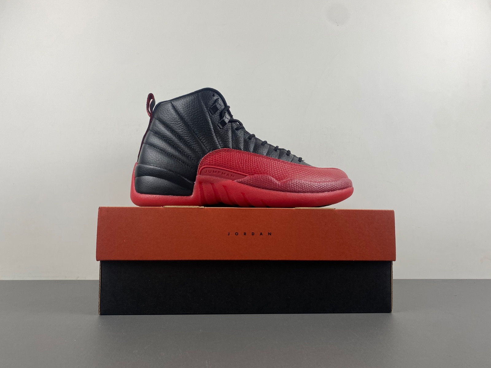 Jordan 12 Retro Flu Game (2016) 130690-002