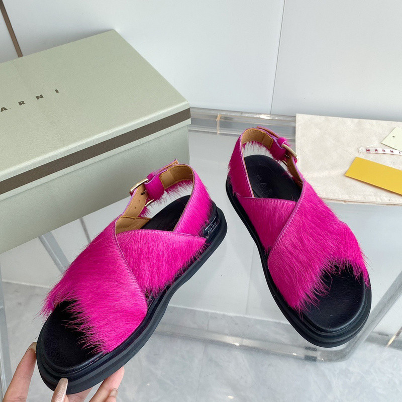 FUCHSIA LONG-HAIR CALFSKIN FUSSBETT