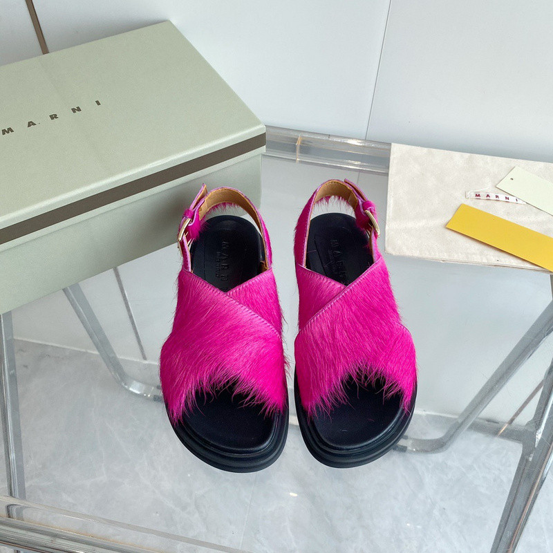 FUCHSIA LONG-HAIR CALFSKIN FUSSBETT