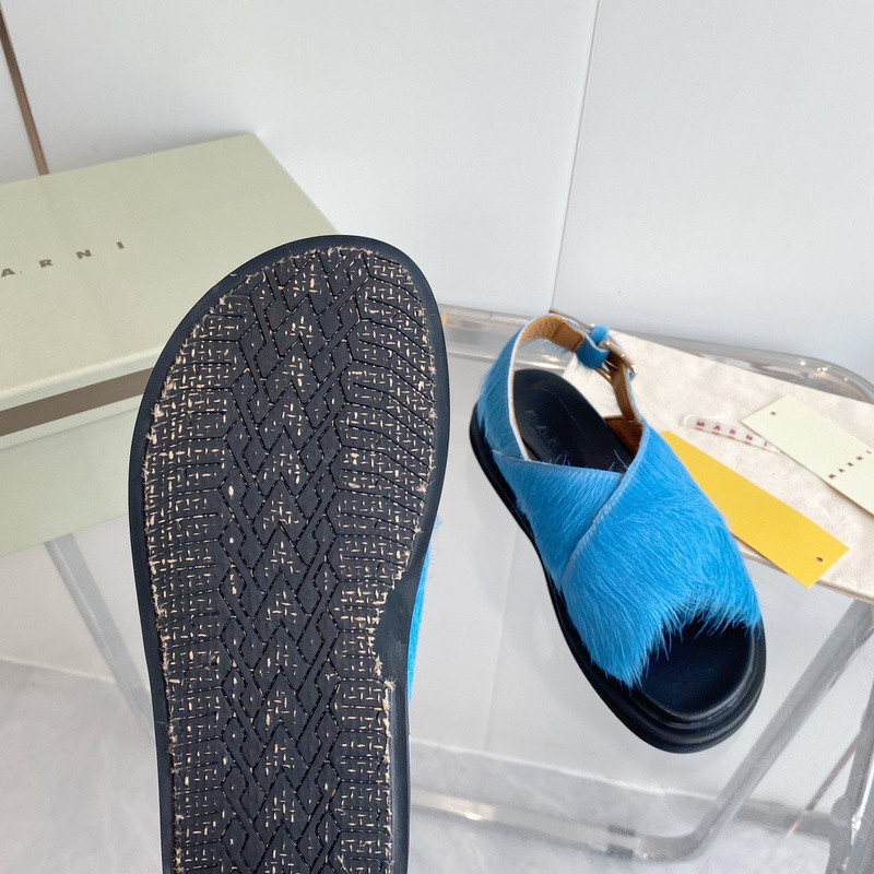 FUCHSIA LONG-HAIR CALFSKIN FUSSBETT