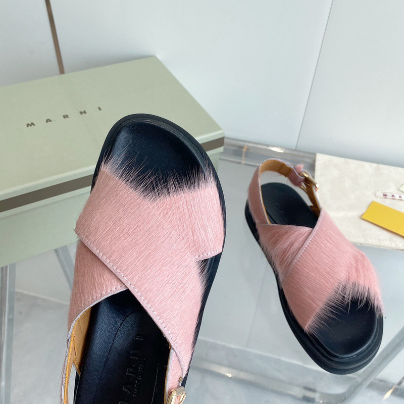 FUCHSIA LONG-HAIR CALFSKIN FUSSBETT