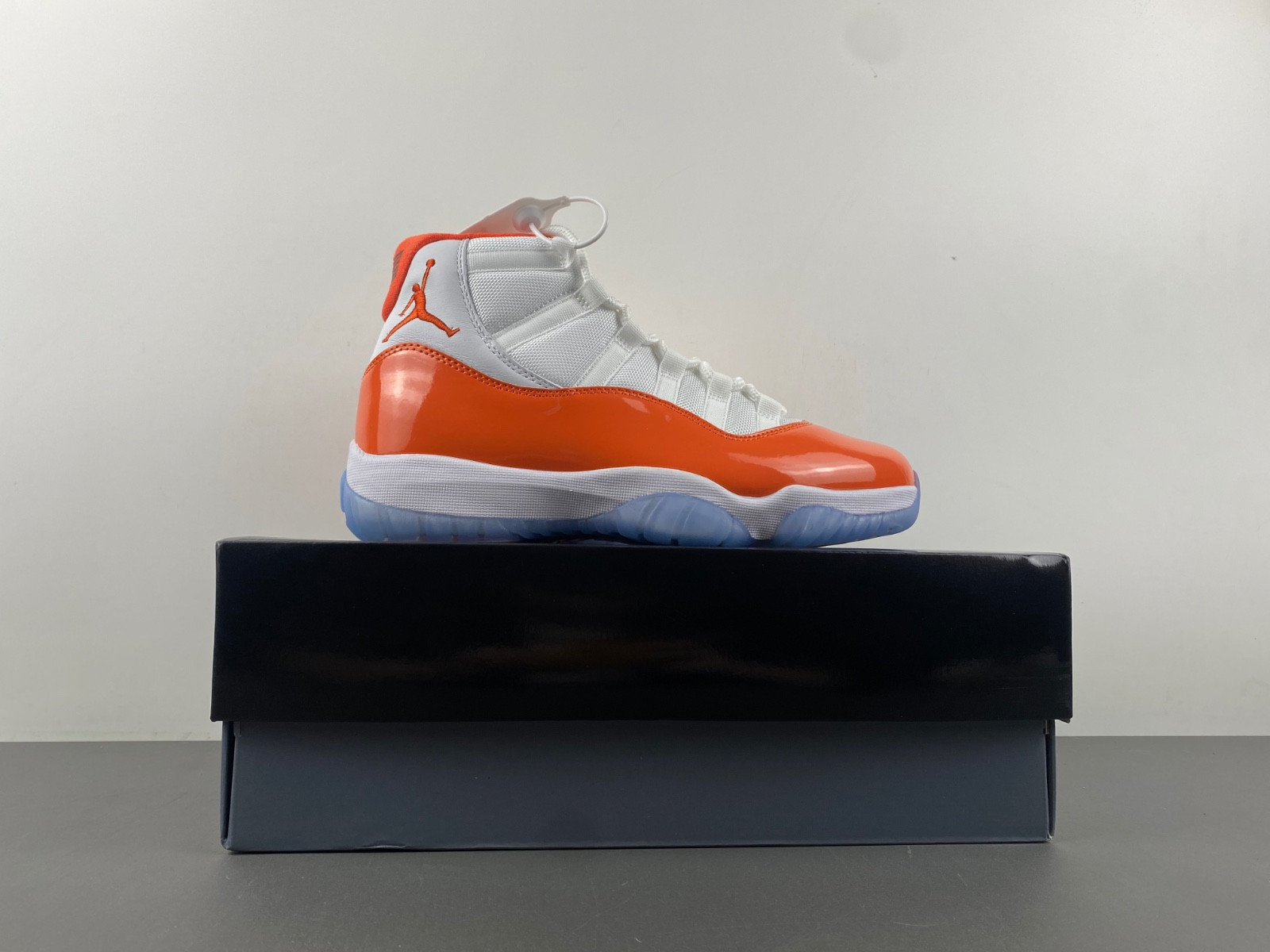 Air Jordan 11 Retro white orange